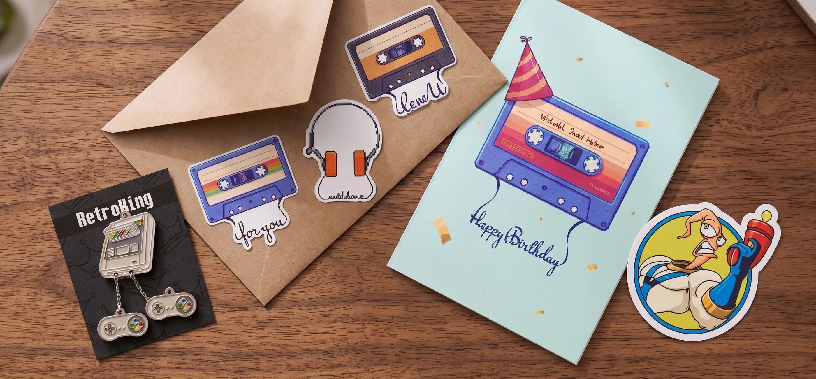 Collection of retro-themed greeting cards and stickers on a wooden surface